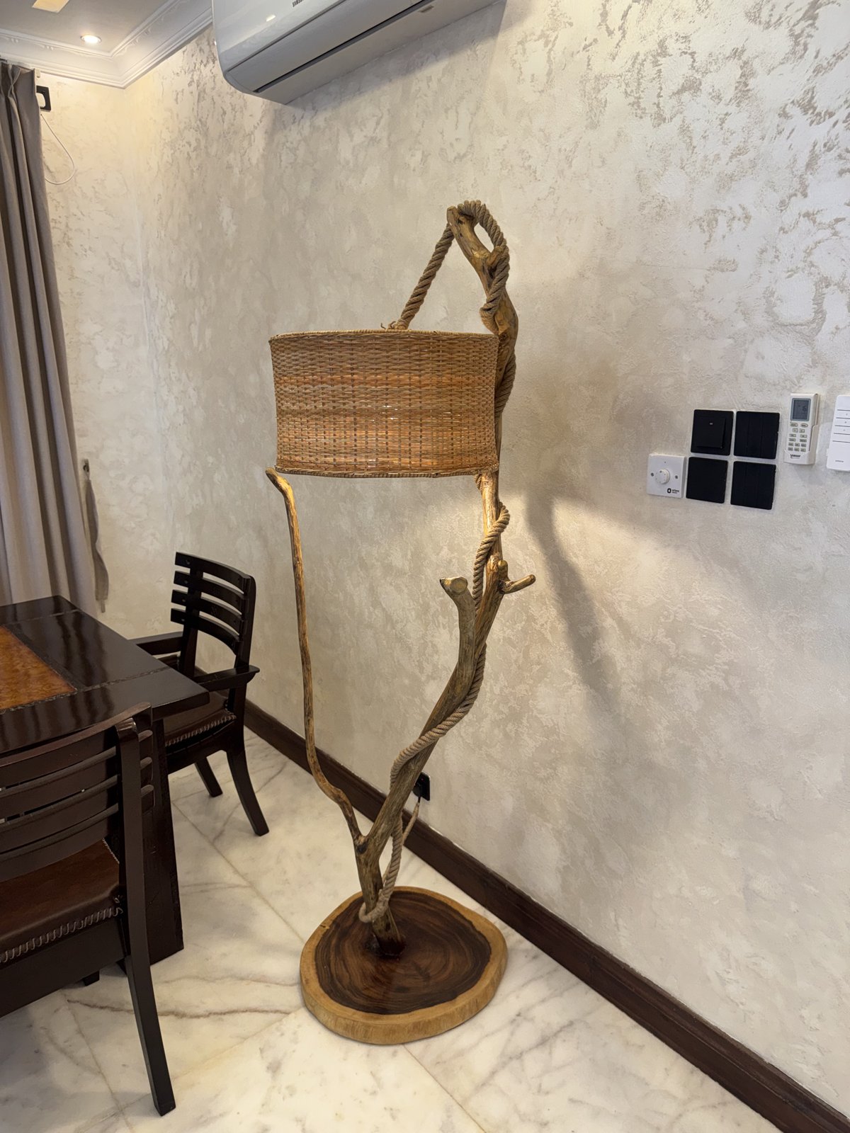 The Branch Lamp — A sculptural floor lamp shaped from natural branch wood.